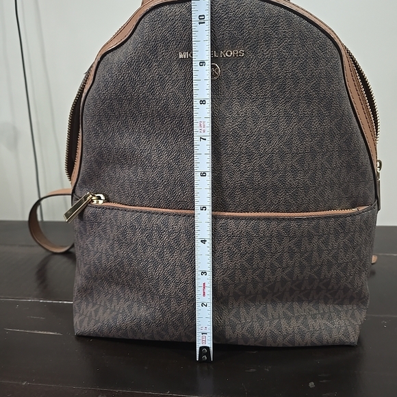 Michael Kors Valerie medium logo backpack in brown and acorn PVC and leather.  - Picture 6 of 13